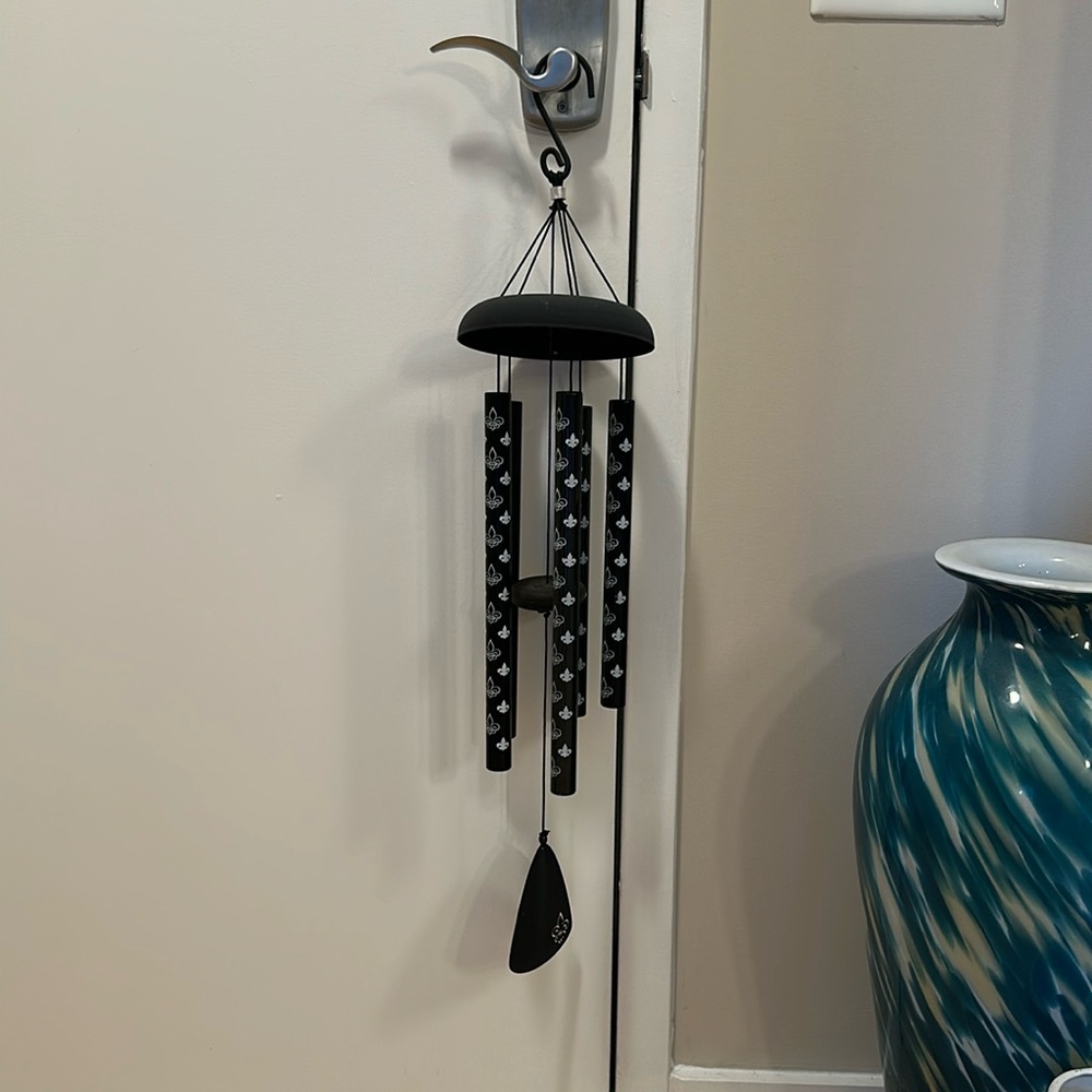 Carons fleur de lis wind chime by Carson